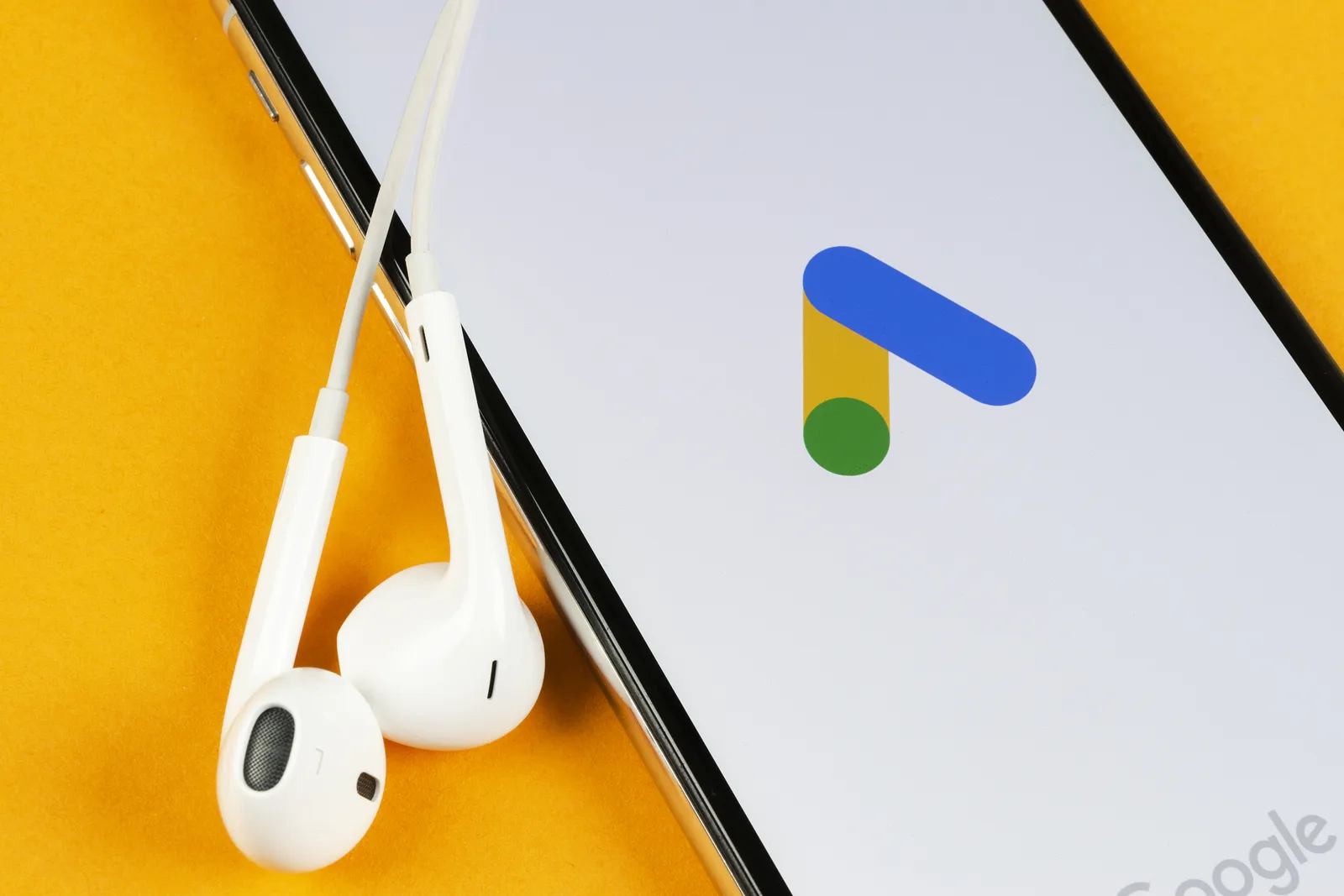 Phone with Google Adds app pulled up.