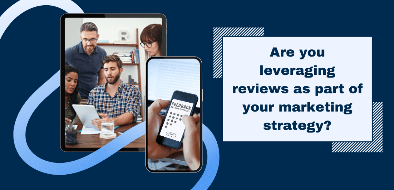 Four colleagues sitting down at a table looking at their reviews on an iPad.